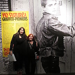 Louise Schiffmacher and Henriëtte Vičs in front of the photo of Dr. Rat. Photo Annemarie de Wildt