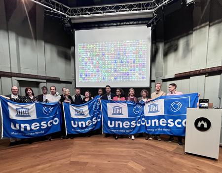 Uitreiking UNESCO-vlag in De Waag